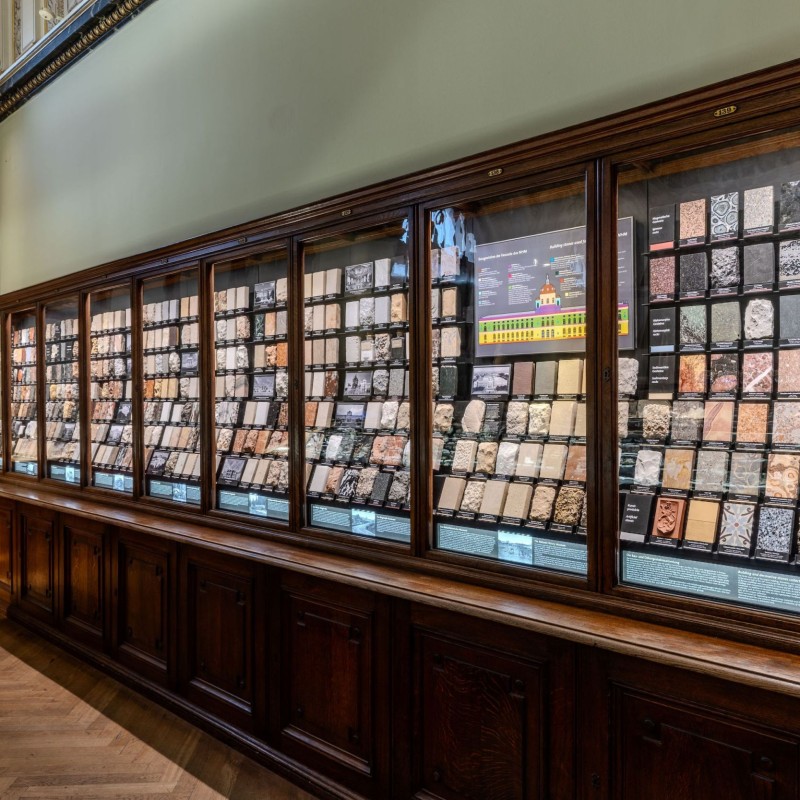 Display case in Hall 1 of the Natural History Museum featuring building and decorative
                                 stones