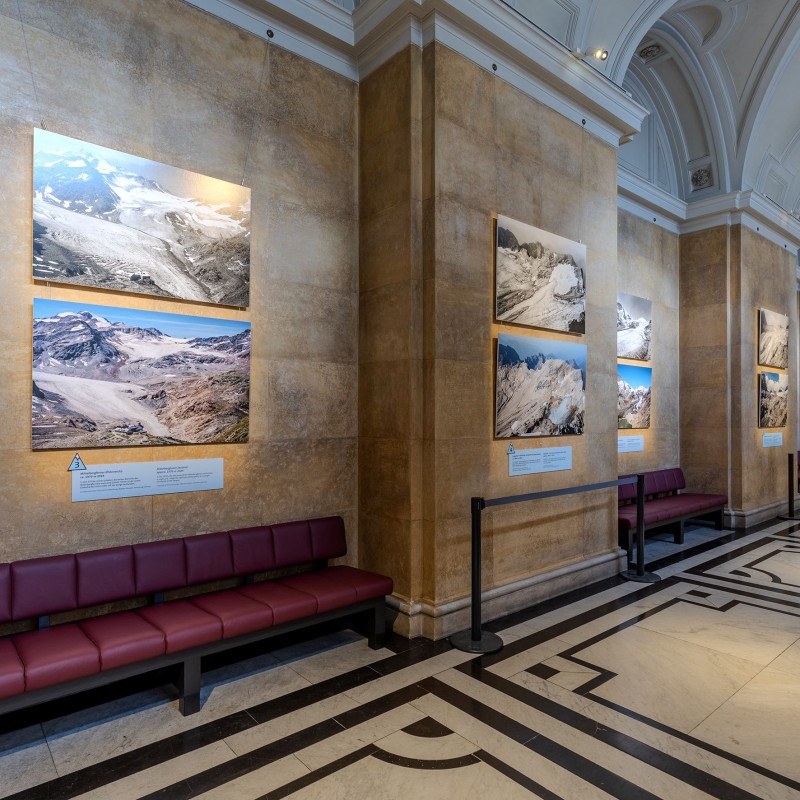 Corridor of the NHM Vienna with pictures from the
                                 exhibition 
