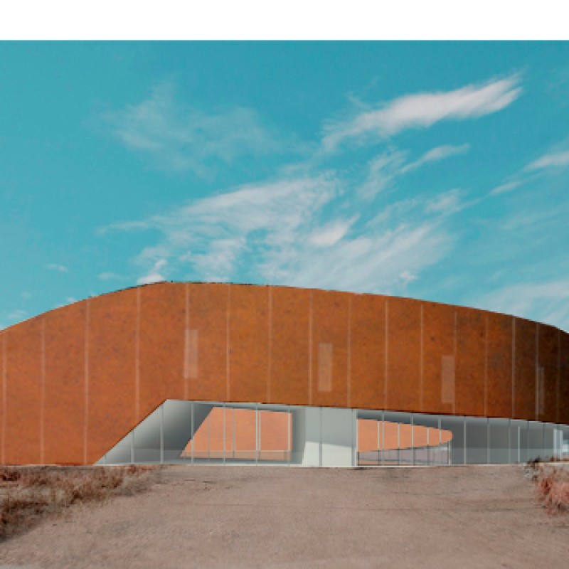 Low, modern circular building with rust-colored exterior panels, set in open landscape under a cloudy sky. (AI-generated
                                 alt-text, generated with GPT-4.1-mini)