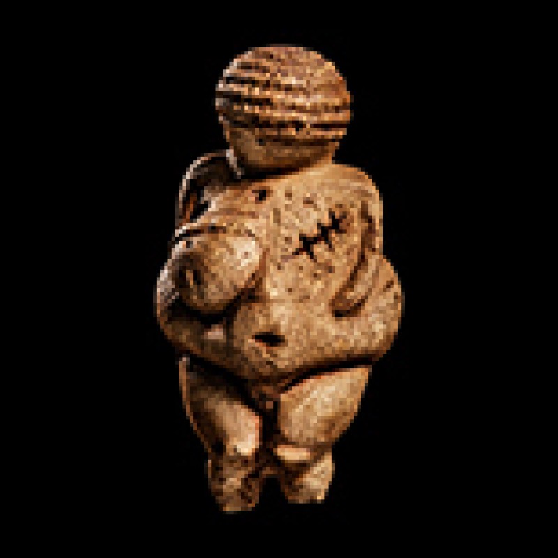 Limestone
                                 figurine with prominent body shapes, short legs, and incised patterns on head and back. (AI-generated alt-text, generated
                                 with GPT-4.1-mini)