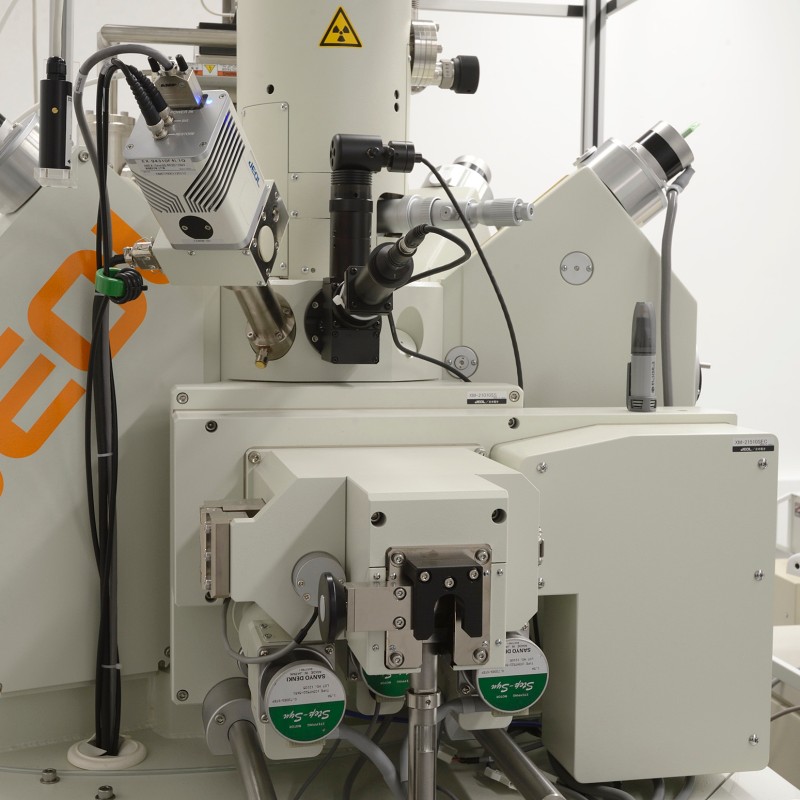 Large scientific analysis instrument with multiple cables and attachments, monitor displaying measurement data to
                                 the right. (AI-generated alt-text, generated with GPT-4.1-mini)