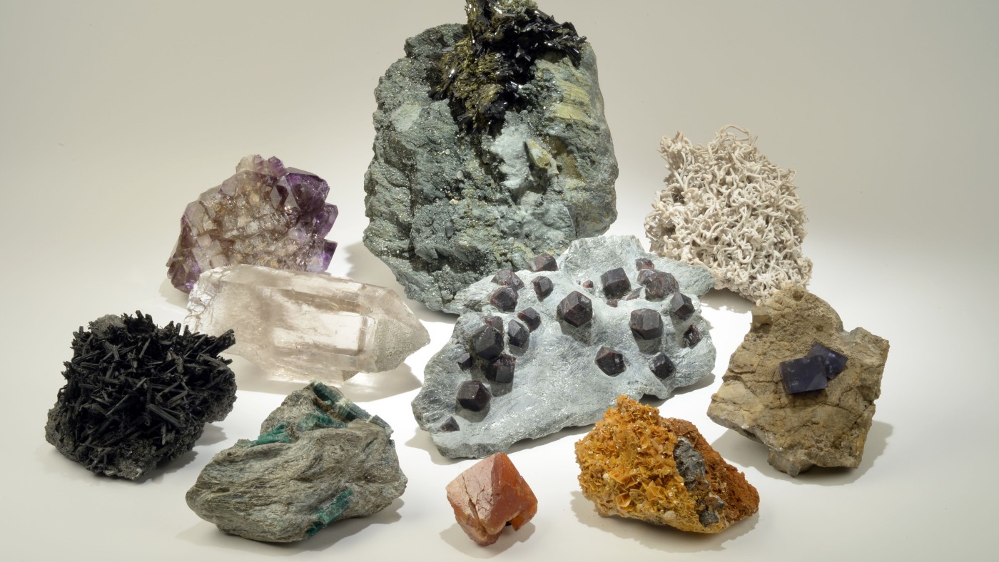 Group of mineral
                                 samples of various colors, sizes, and shapes, some displaying distinct crystal structures. (AI-generated alt-text, generated
                                 with GPT-4.1-mini)