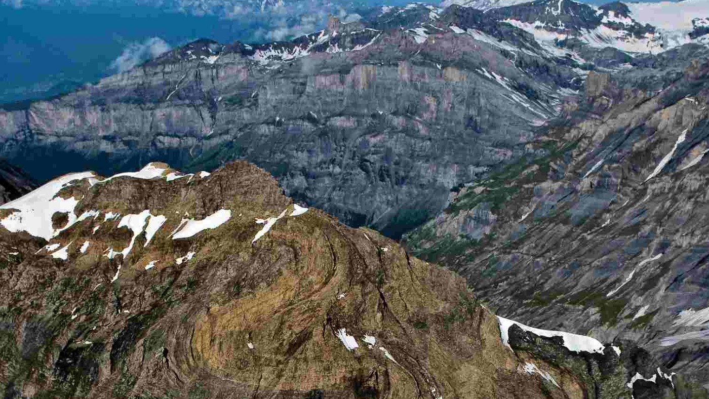 : The Balmhorn Mountains in Switzerland were created when former marine sediments were pushed up against each other to create gigantic folds.
© Kurt Stüwe (University Graz), http://www.alpengeologie.org