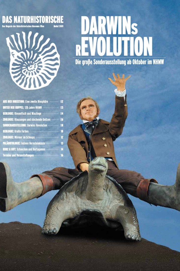 Titelseite
                                 mit großem Farbfoto einer nachgestellten Szene: Ein Mann in Anzug sitzt auf einem Schildkrötenpanzer vor blauem Himmel. Oben
                                 weißes Logo mit Ammonit und fett gesetzter Titeltext: 'DAS NATURHISTORISCHE', 'DARWINs REVOLUTION'. (KI-generierter Alt-Text,
                                 erstellt mit GPT-4.1-mini)