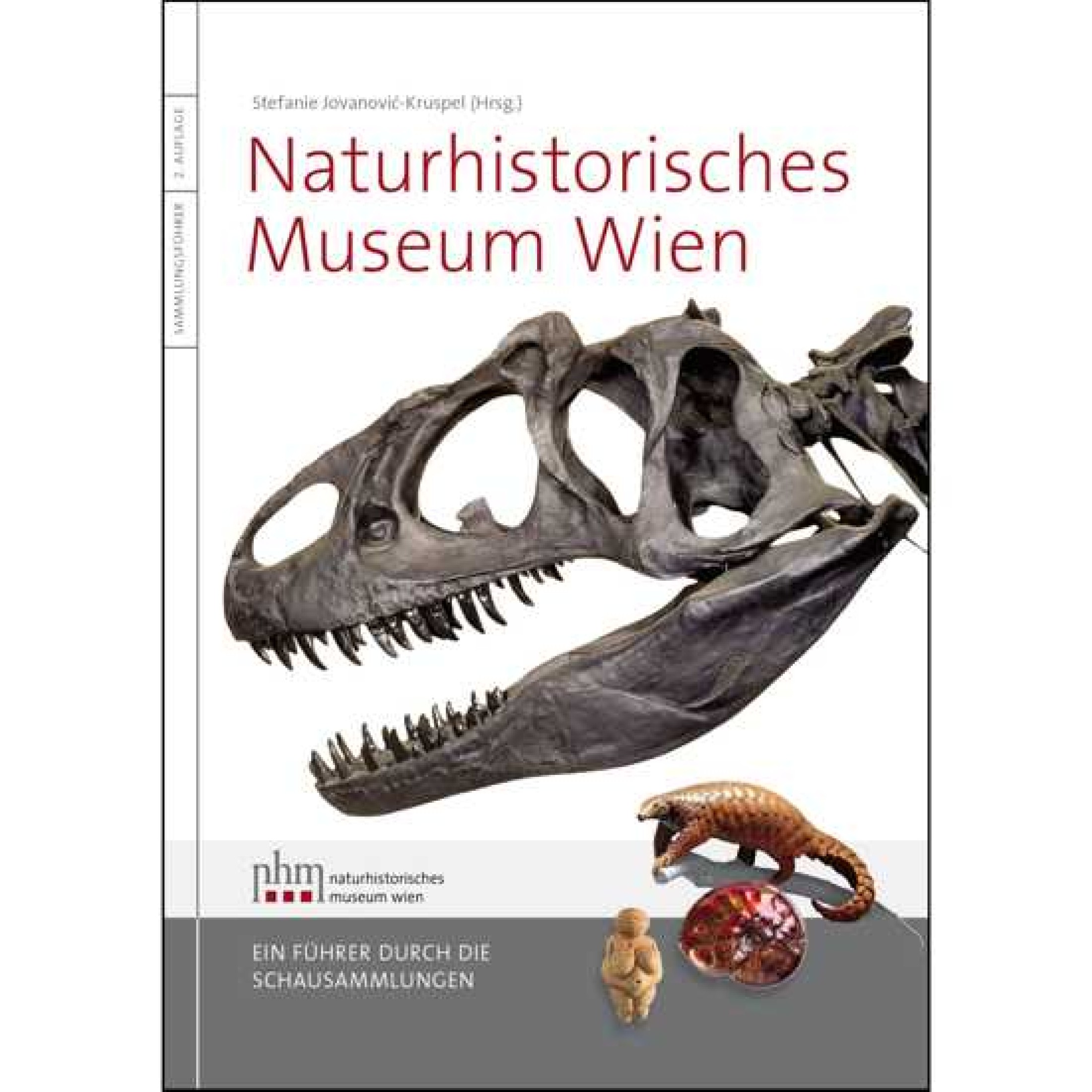 : Buchcover mit großem Dinosaurierschädel, darunter drei kleinere Tiermodelle, oben Titel und Herausgebername. (KI-generierter Alt-Text, erstellt mit GPT-4.1-mini)