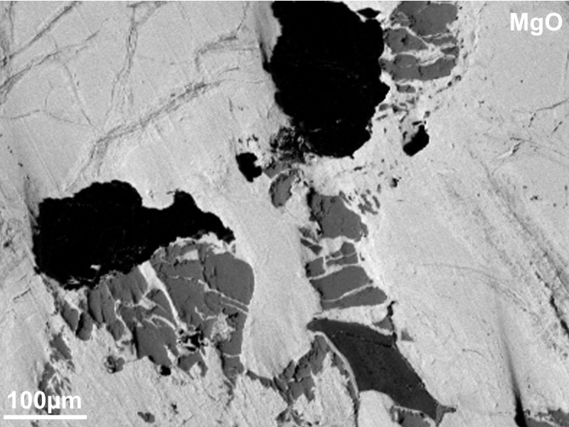 Element distribution map in grayscale for magnesium in a basalt, showing the distribution of a selected element in the rock. The brightness of the gray value corresponds to the magnesium content.: Element distribution map in grayscale for magnesium in a basalt, showing the distribution of a selected element in the rock. The brightness of the gray value corresponds to the magnesium content.